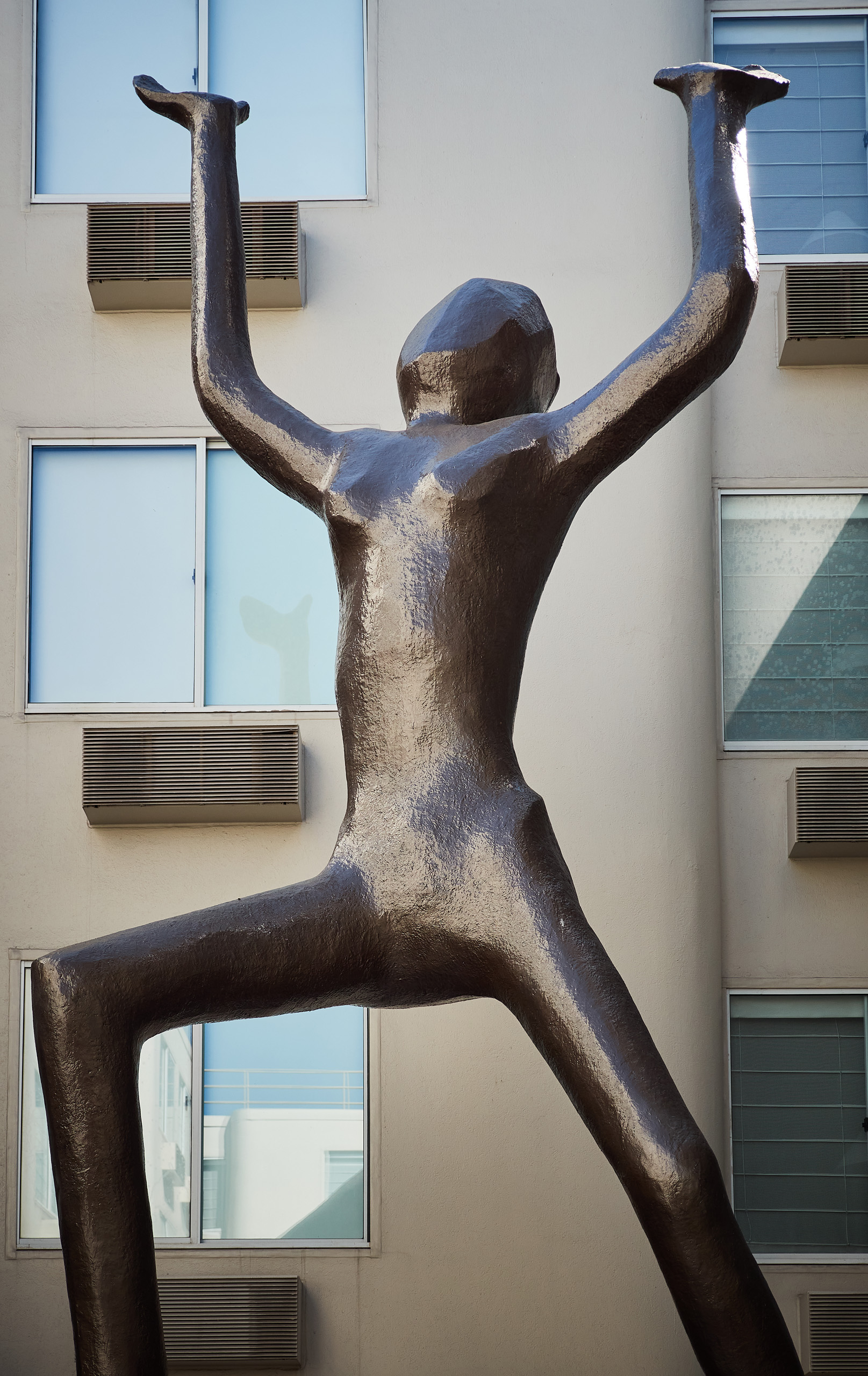 Close-up of bronze courtyard statue