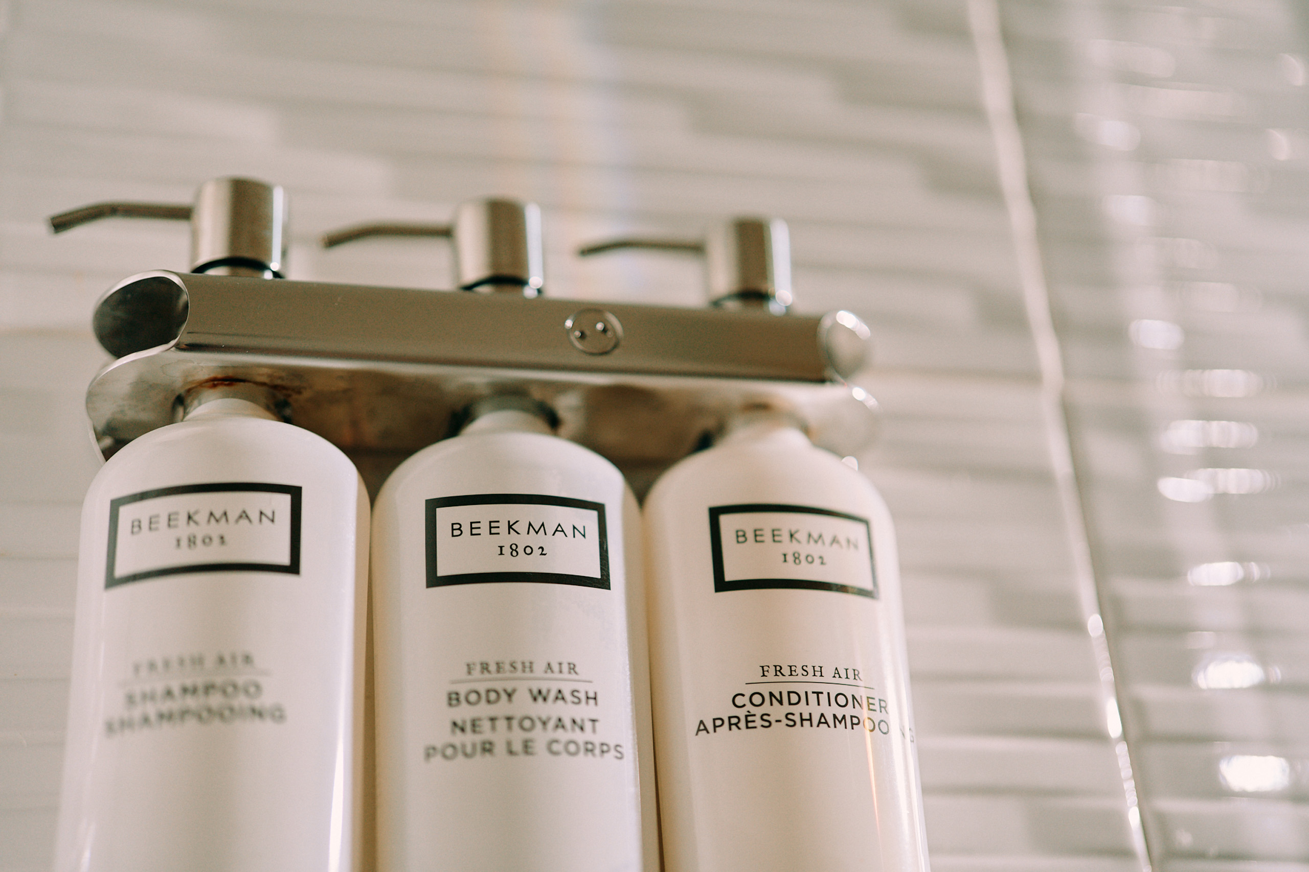 Mounted Beekman toiletries in hotel shower