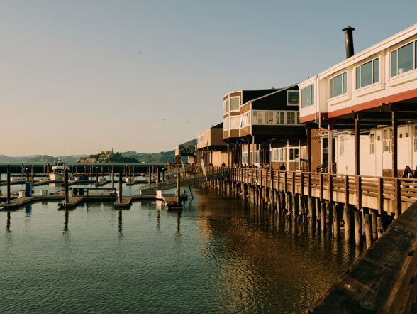 Pier 39 boardwalk overlooking marina.