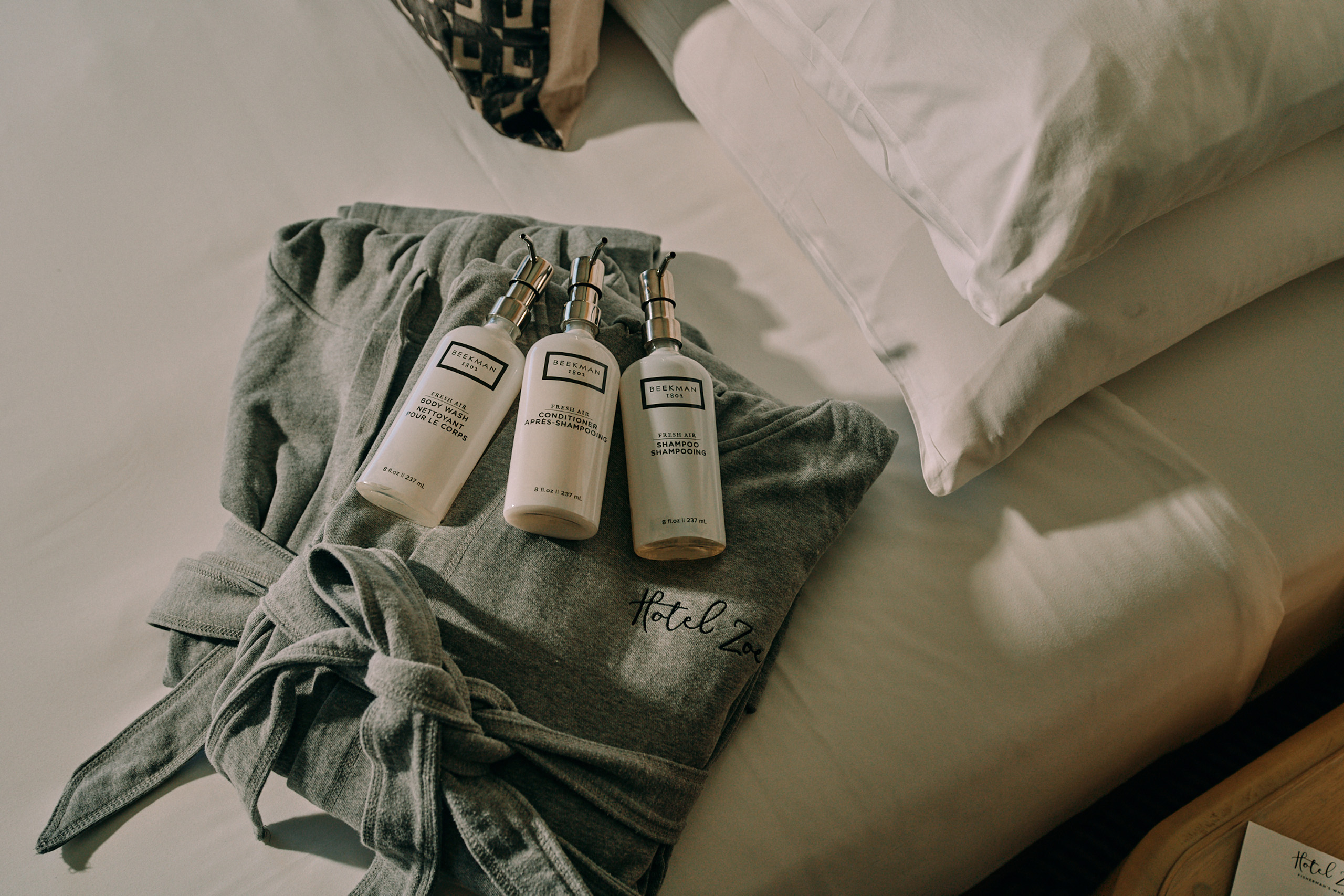 Beekman toiletries on folded hotel robe