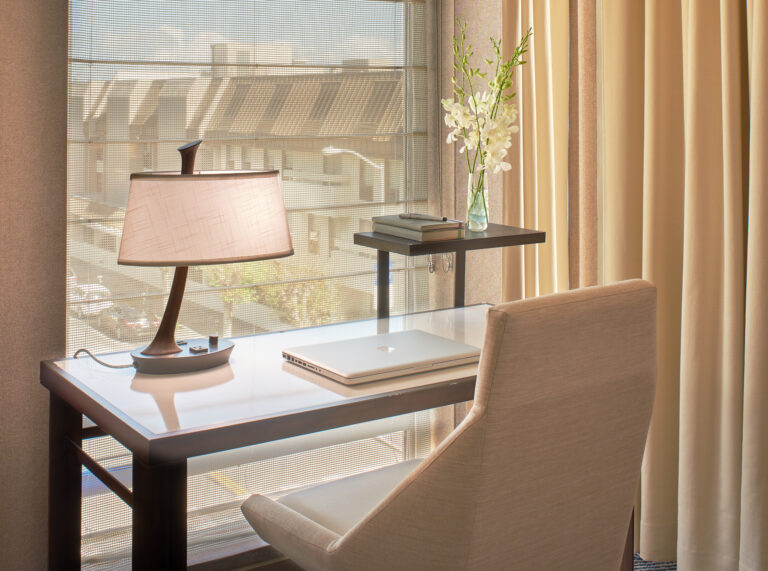 Bright workspace with desk and lamp