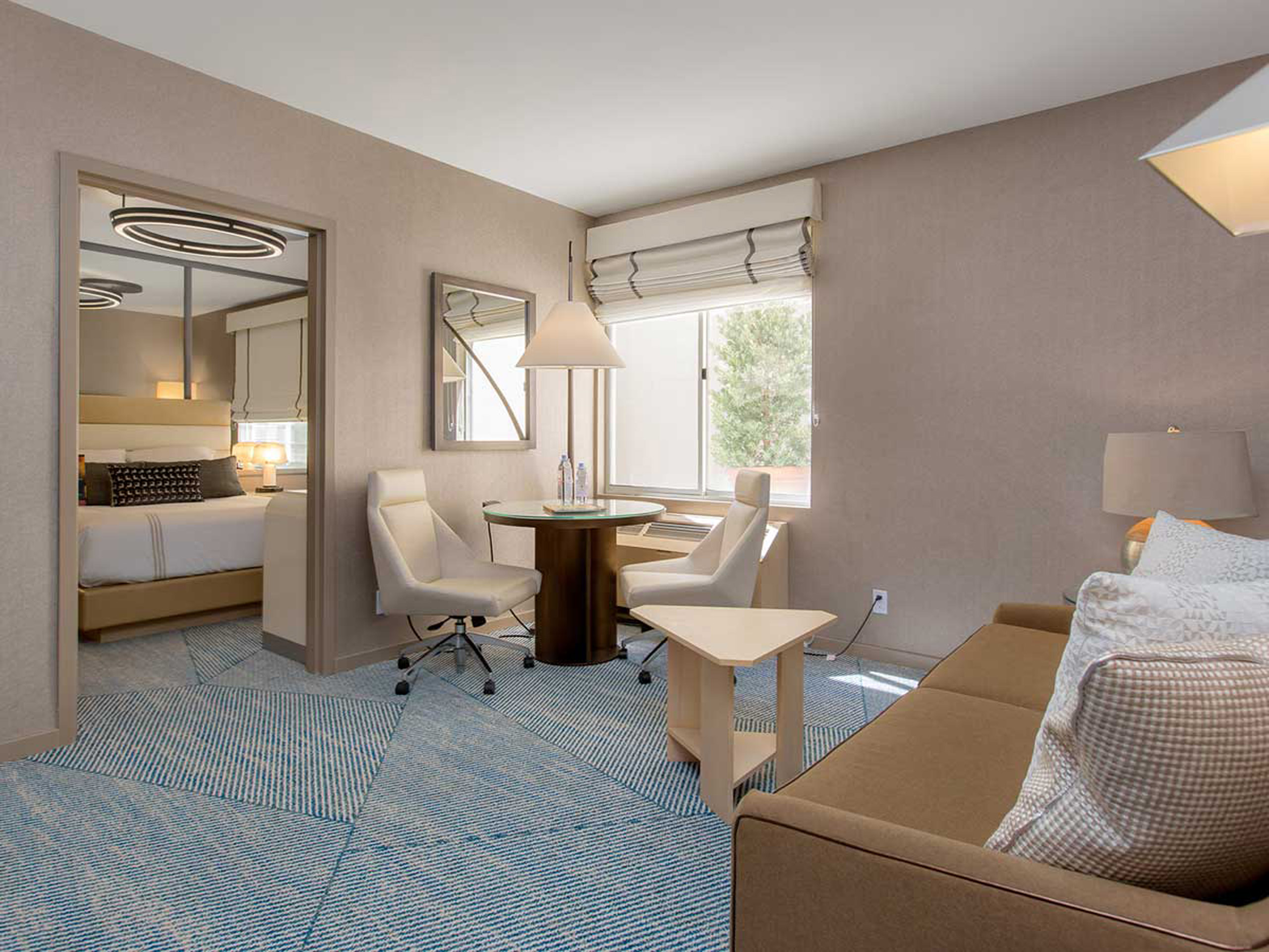 Suite living area with sofa and chairs